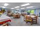 Bright dining area with ample seating, large windows, and well-lit interior at 12565 Sheridan Blvd # 105, Broomfield, CO 80020