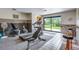 Community gym equipped with modern exercise equipment and natural light at 12565 Sheridan Blvd # 105, Broomfield, CO 80020