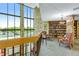 Grand lobby with stone accents, large windows, and comfortable seating area at 12565 Sheridan Blvd # 105, Broomfield, CO 80020