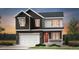 Charming two-story home features a two-car garage, brick accents, and a welcoming front porch at 3333 N Catawba Way, Aurora, CO 80019