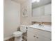 Clean bathroom with a modern vanity, neutral color scheme, and functional layout at 5573 S Lowell Blvd, Littleton, CO 80123