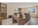 Comfortable living room with wood floors, a cozy fireplace, and stylish decor at 5573 S Lowell Blvd, Littleton, CO 80123