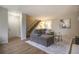 Inviting living room featuring a staircase, comfortable seating, and stylish decor at 5573 S Lowell Blvd, Littleton, CO 80123