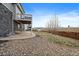 View of backyard with patio and shed and mountain views at 8695 Torrey St, Arvada, CO 80007