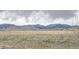 Open space and mountain views from the backyard at 8695 Torrey St, Arvada, CO 80007