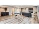 Finished basement space with a bar, game table, tv and comfortable seating at 8695 Torrey St, Arvada, CO 80007