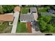 A nice aerial view of a single Gathering home with well maintained yard and detached garage in a mature neighborhood at 2542 S Winona Ct, Denver, CO 80219