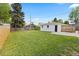 Spacious backyard with a detached garage at 2542 S Winona Ct, Denver, CO 80219