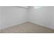 Unfinished basement featuring neutral carpet and a window to let the sunlight in at 2542 S Winona Ct, Denver, CO 80219