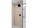 Shower with black fixtures, decorative tile and a modern design at 2542 S Winona Ct, Denver, CO 80219