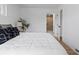 Spacious bedroom with plush carpeting, lots of natural light, and neutral colors at 2542 S Winona Ct, Denver, CO 80219