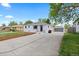 Charming home featuring a new driveway and fresh mulch at 2542 S Winona Ct, Denver, CO 80219