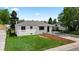 Well manicured front yard with an updated home at 2542 S Winona Ct, Denver, CO 80219