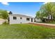 Well maintained lawn and freshly mulched garden beds in front of this lovely home at 2542 S Winona Ct, Denver, CO 80219
