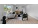 Bright living room featuring stylish decor, neutral color palette, and lots of natural light at 2542 S Winona Ct, Denver, CO 80219