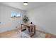 Bright home office with neutral color scheme and lots of natural light at 2542 S Winona Ct, Denver, CO 80219