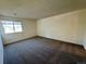 Bright bedroom with large window and neutral carpet at 12470 E Cornell Ave # 203, Aurora, CO 80014
