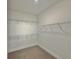 Large walk-in closet with wire shelving at 42978 Colonial Trl, Elizabeth, CO 80107