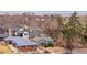 An aerial view of a cozy home nestled in a neighborhood with beautiful mountain views at 4325 Perry St, Denver, CO 80212