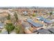 A high-angle shot showing a house with the property lines marked with a red line at 4325 Perry St, Denver, CO 80212