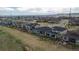 Aerial view of homes featuring fenced yards in a Gathering-friendly neighborhood at 19409 W 88Th Dr, Arvada, CO 80007