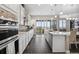 Contemporary kitchen featuring stainless steel appliances, ample counter space, and a gas stove at 19409 W 88Th Dr, Arvada, CO 80007