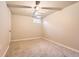 Clean basement bedroom with carpeted floors, a ceiling fan, and a small window at 1255 S Hoyt St, Lakewood, CO 80232