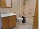 Cozy bathroom with a tiled floor, vanity, and shower-tub combination, ready for personal touches at 1415 S Pitkin Ct, Aurora, CO 80017