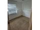Bedroom with carpet, window with blinds, and white trim around the walls at 1415 S Pitkin Ct, Aurora, CO 80017