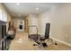 Versatile basement space featuring fitness equipment and room for recreation or storage at 8272 E 55Th Pl, Denver, CO 80238