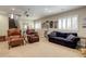 Basement features neutral carpeting, recessed lighting, and a home theater projector at 8272 E 55Th Pl, Denver, CO 80238