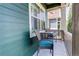Cozy porch with comfortable seating, perfect for relaxing outdoors at 8272 E 55Th Pl, Denver, CO 80238