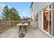 Enjoy this outdoor deck area with gray wood and backyard access at 8164 S York Ct, Centennial, CO 80122