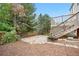 Outdoor living on a stone patio and wood-chip backyard at 8164 S York Ct, Centennial, CO 80122