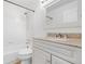 Bathroom with a tub and a granite vanity at 8164 S York Ct, Centennial, CO 80122