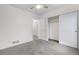 Bedroom features a neutral carpet, a fan and closet at 8164 S York Ct, Centennial, CO 80122