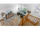 Spacious room with a two-story window, stylish decor, hardwood floors, and an open, inviting atmosphere at 8164 S York Ct, Centennial, CO 80122