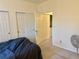 The bedroom has an ensuite bath and closets with easy access to the laundry room at 14353 E 1St Dr # 302, Aurora, CO 80011