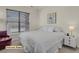 Bright bedroom with large window and neutral decor at 14353 E 1St Dr # 302, Aurora, CO 80011