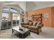 Previously staged living room boasts high ceilings, bright wall and balcony access at 14353 E 1St Dr # 302, Aurora, CO 80011