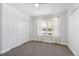 Spacious bedroom with double door closet and carpeted floor at 22586 E Union Cir, Aurora, CO 80015