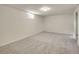 Finished basement with carpet flooring, a small window and recessed lighting at 7881 Kenwood St, Commerce City, CO 80022