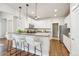 Modern kitchen featuring granite countertops and stainless steel appliances at 9777 W Stanford Ave, Denver, CO 80123