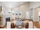 Bright living room featuring a fireplace and comfortable seating at 9777 W Stanford Ave, Denver, CO 80123