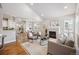 Spacious living room with fireplace and hardwood floors at 9777 W Stanford Ave, Denver, CO 80123