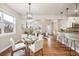 Inviting living space with a view of the dining area and kitchen at 9777 W Stanford Ave, Denver, CO 80123