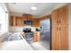 Well-equipped kitchen featuring stainless steel appliances, ample cabinetry, and a double stainless steel sink at 18950 E Kent Cir, Aurora, CO 80013