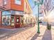 Exterior view of a brick building housing 'Hunter Bay Coffee Roasters' with streetscape at 6011 Yarrow St # C, Arvada, CO 80004