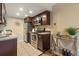 Efficient kitchen features stainless steel appliances, granite countertops and wood cabinets at 6011 Yarrow St # C, Arvada, CO 80004