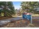 Memorial Park sign surrounded by lush greenery, providing a serene natural environment at 6011 Yarrow St # C, Arvada, CO 80004